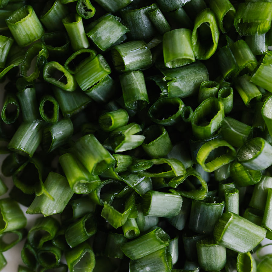 Herbalist carefully preparing a herbal potion