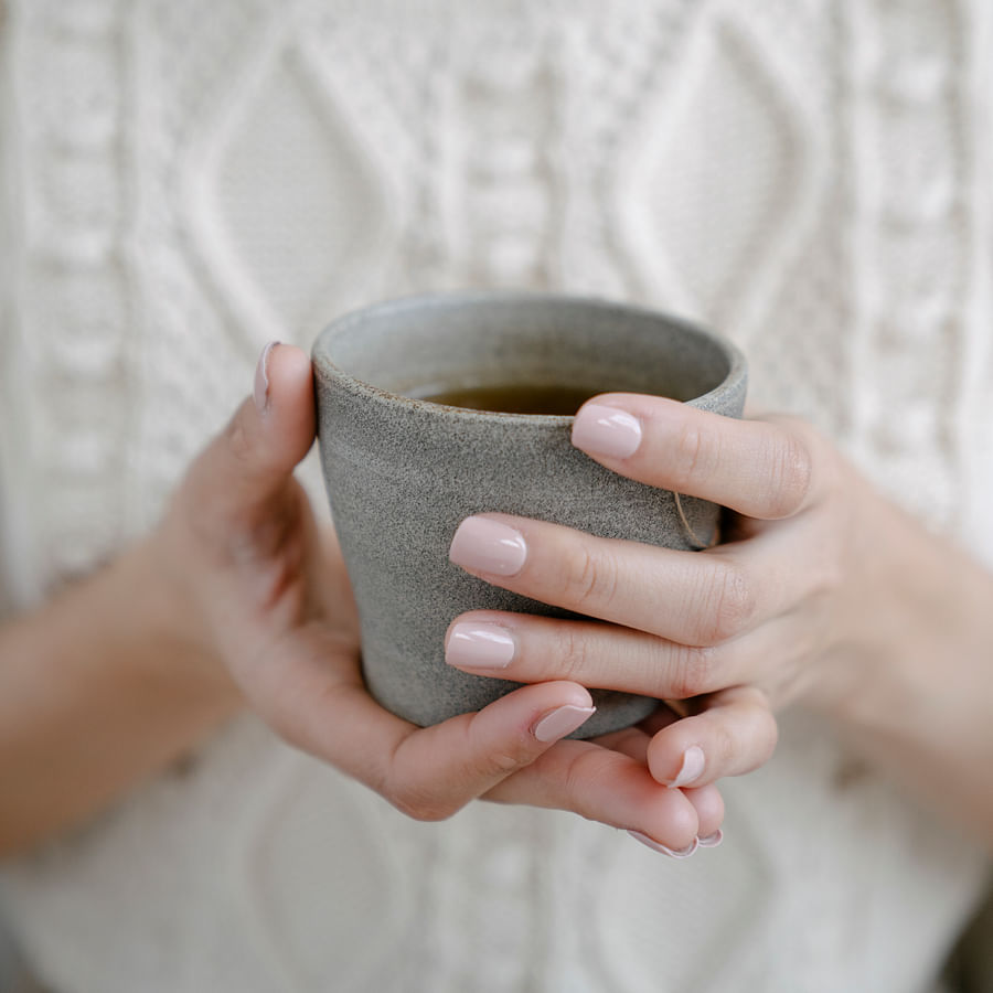 A soothing cup of herbal tea in a serene setting